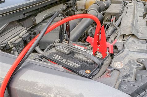 can you disconnect jumper cables while car is running